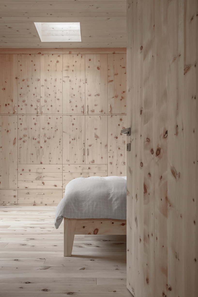 interior shot of the bedroom, clad in wood