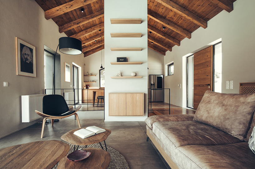 polyergo's summer house sits on a steep slope on the island of crete, greece