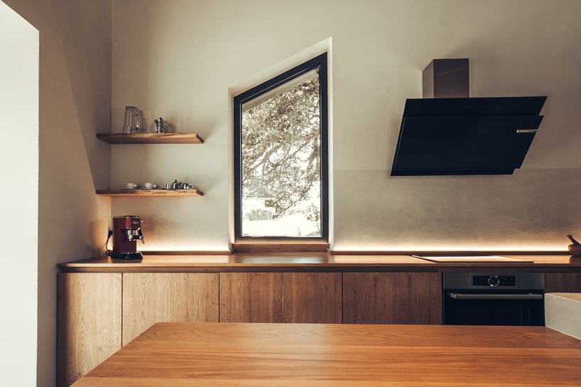 polyergo's summer house sits on a steep slope on the island of crete, greece