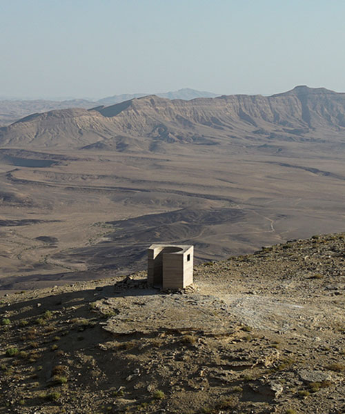 sand + rocks form 'landroom' observatory overlooking world's largest erosion crater in israel