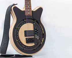 self-playing electric 'circle guitar' can pick at up to 250 bpm