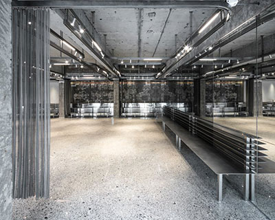 steel counters, concrete walls + metal curtain partitions realize 'basdban' café in shanghai