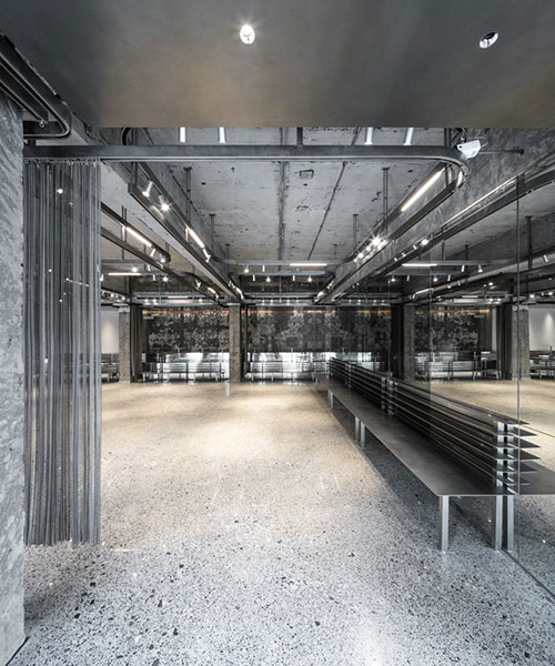 steel counters, concrete walls + metal curtain partitions realize 'basdban' café in shanghai