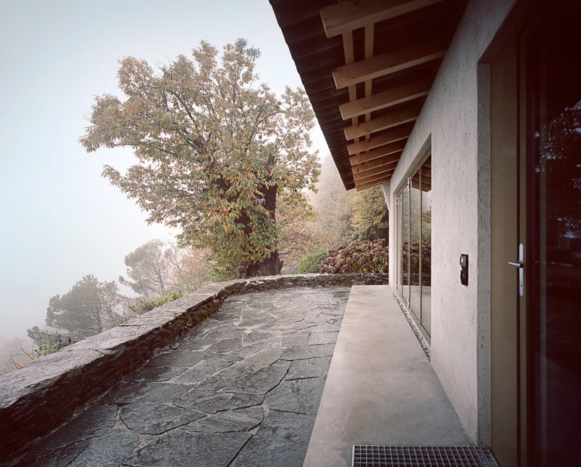 studio inebi renovates 1950's 'calascino' summer house in switzerland