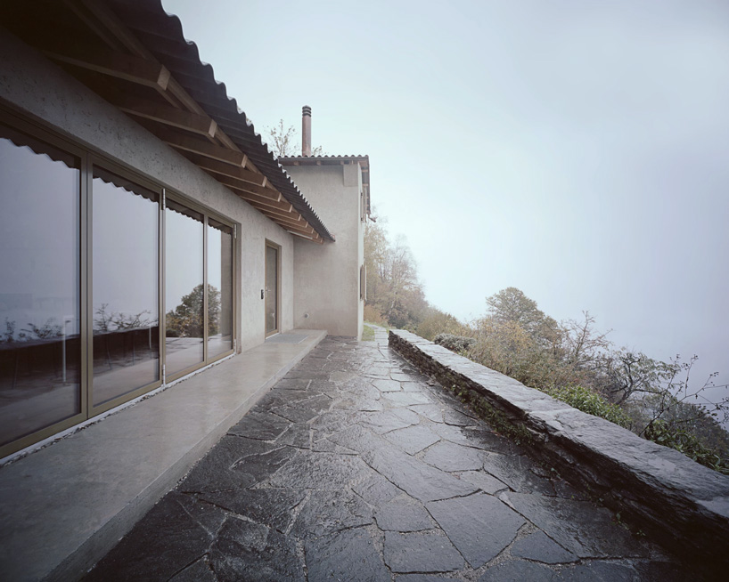 studio inebi renovates 1950's 'calascino' summer house in switzerland