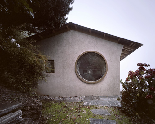 studio inebi renovates 1950's 'calascino' summer house in switzerland