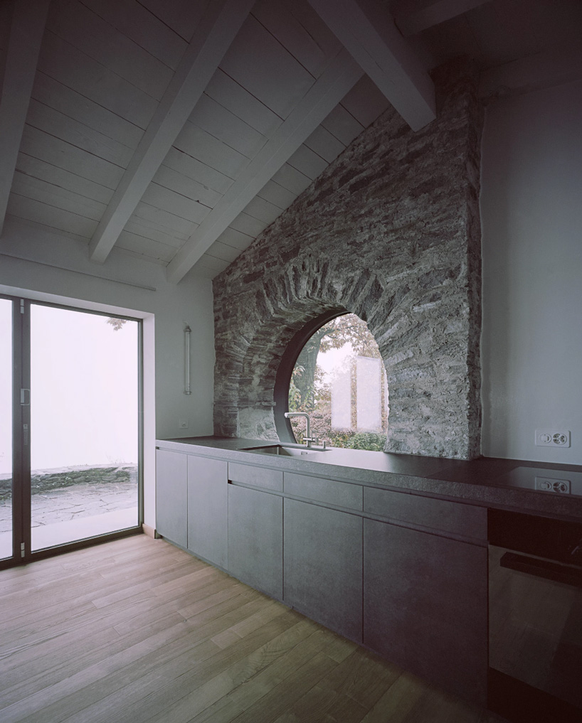 studio inebi renovates 1950's 'calascino' summer house in switzerland