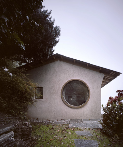 studio inebi renovates 1950's 'calascino' summer house in switzerland