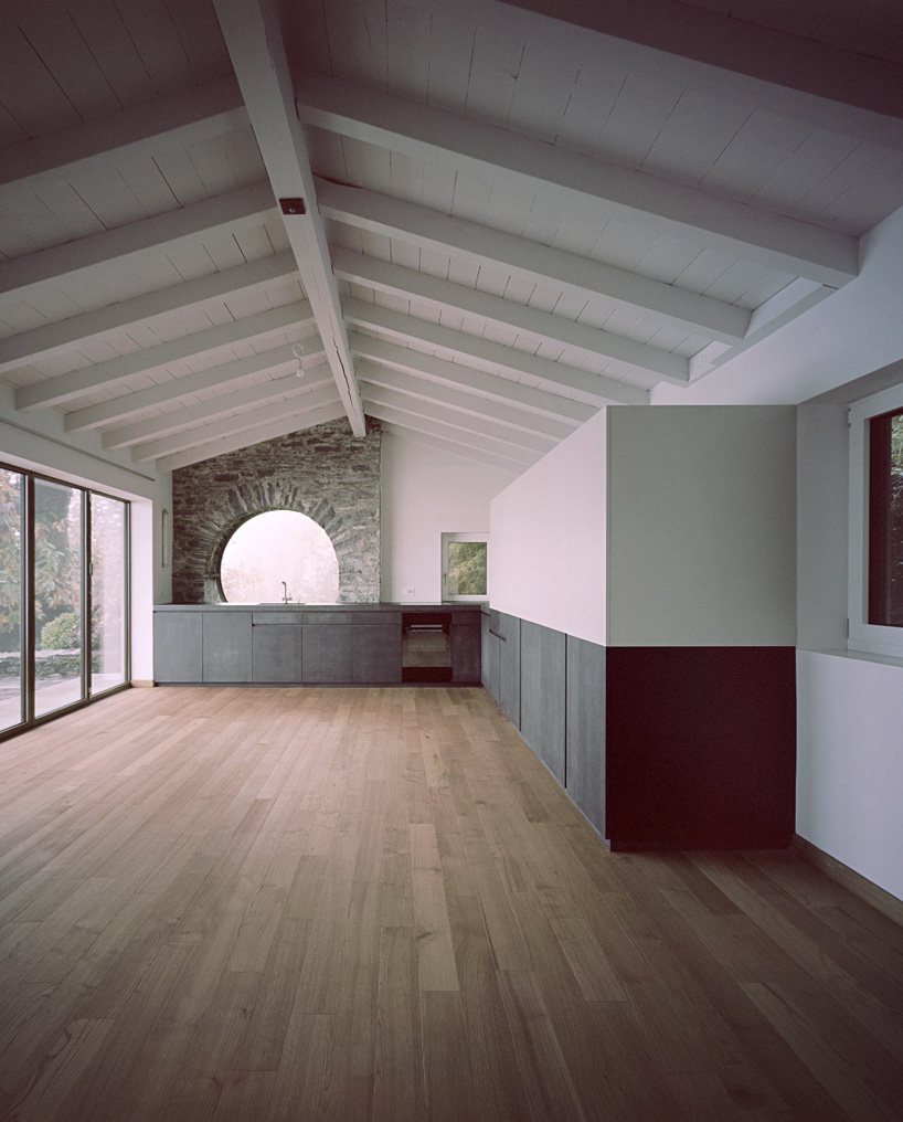 studio inebi renovates 1950's 'calascino' summer house in switzerland