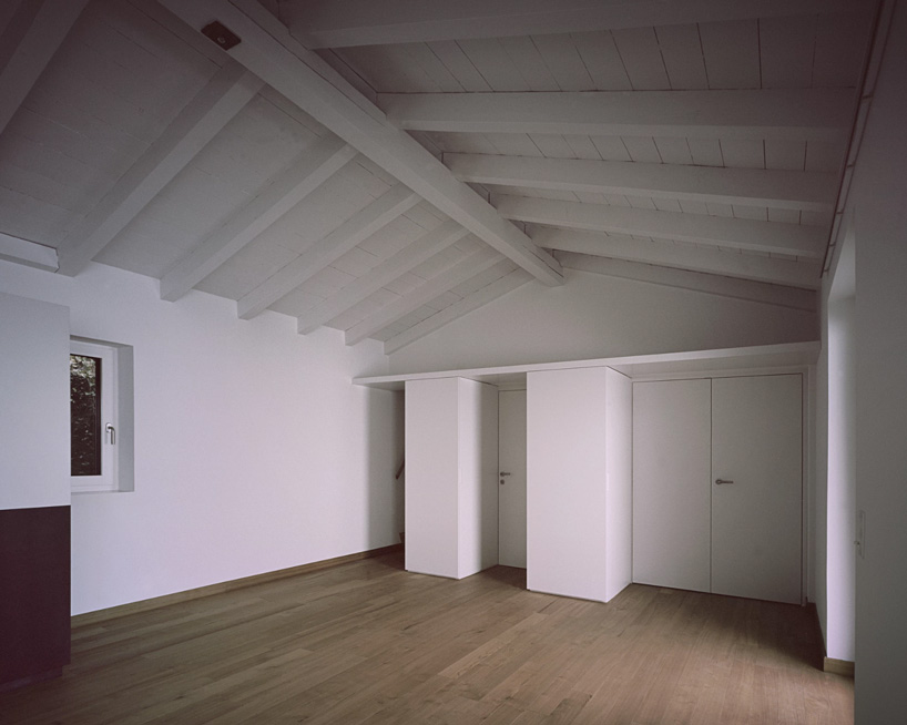 studio inebi renovates 1950's 'calascino' summer house in switzerland