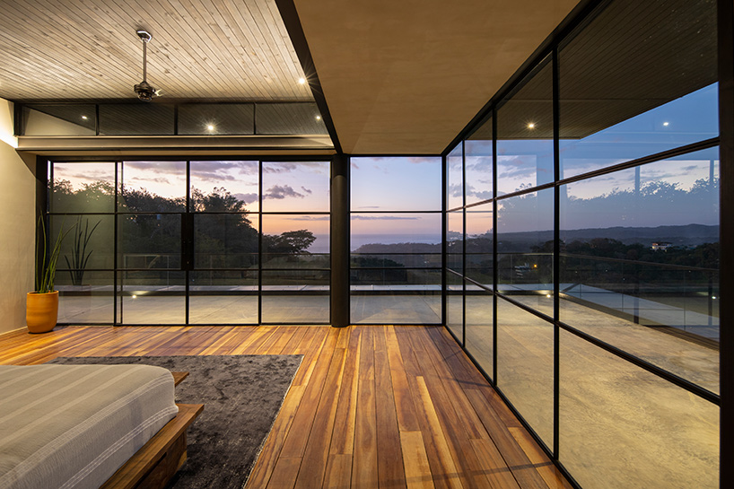 studio saxe clads 'tres amores' house in costa rica with charred timber façades