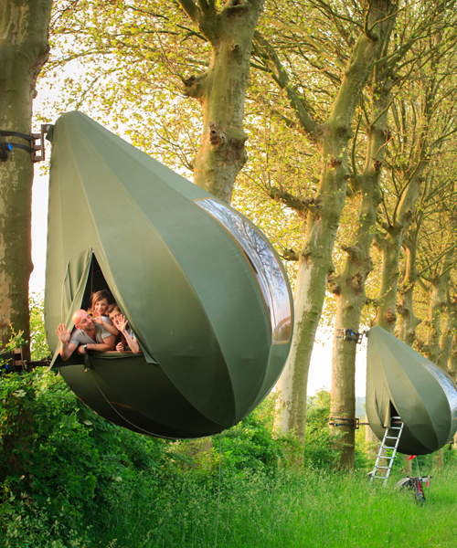 teardrop-shaped tents in belgium let you spend a night hanging from the trees