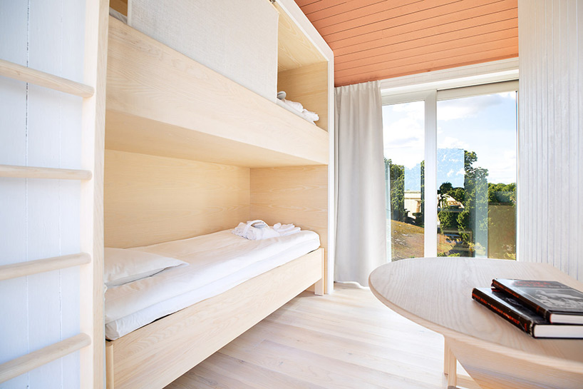 SynVillan is an elevated, mirrored villa at scandinavia's largest safari park