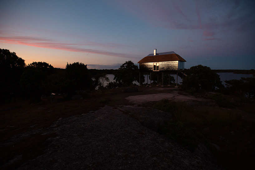 SynVillan is an elevated, mirrored villa at scandinavia's largest safari park