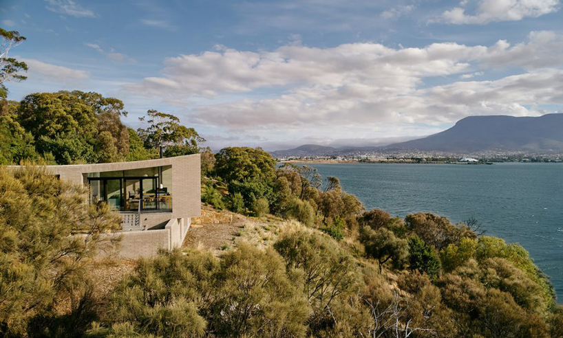 topology studio builds a house overlooking otago bay in tasmania designboom