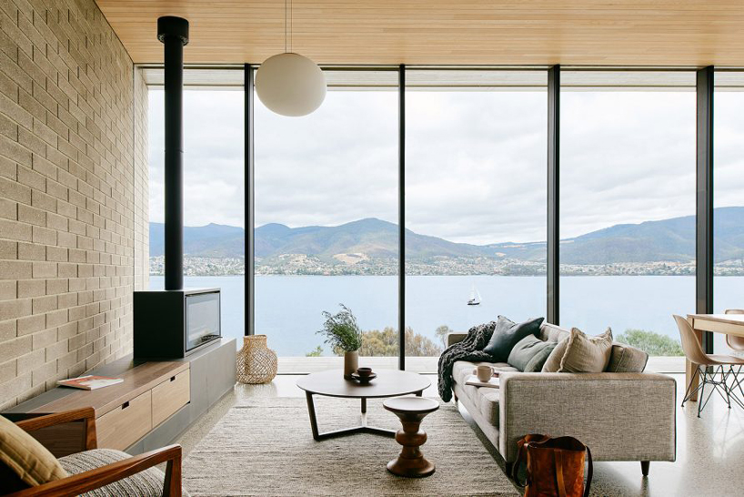 topology studio builds a house overlooking otago bay in tasmania designboom
