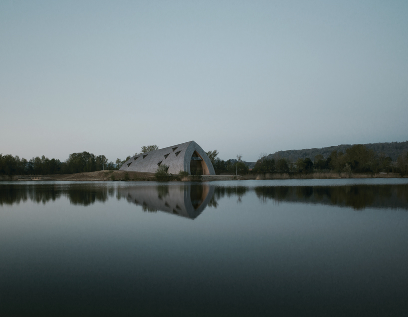 longhouse-inspired 'biodiversum' visitor center blends into a nature reserve in luxembourg