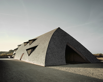 longhouse-inspired 'biodiversum' visitor center blends into a nature reserve in luxembourg
