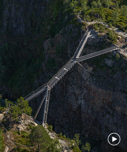 carl-viggo hølmebakk step bridge spans 150 feet over vøringsfossen waterfall in norway