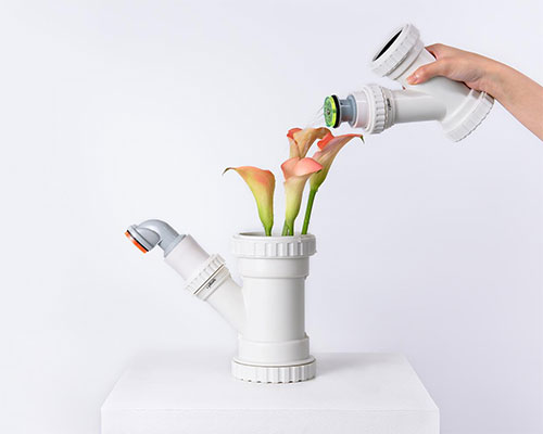 'watering branch' by 1/plinth studio is a gardening tool made out of plumbing parts