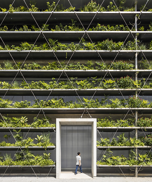 G8A architecture & rollimarchini architekten add green façade to vietnam's jakob factory