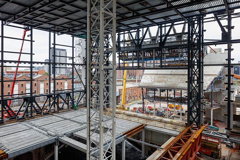 the factory: OMA-designed cultural venue in manchester moves