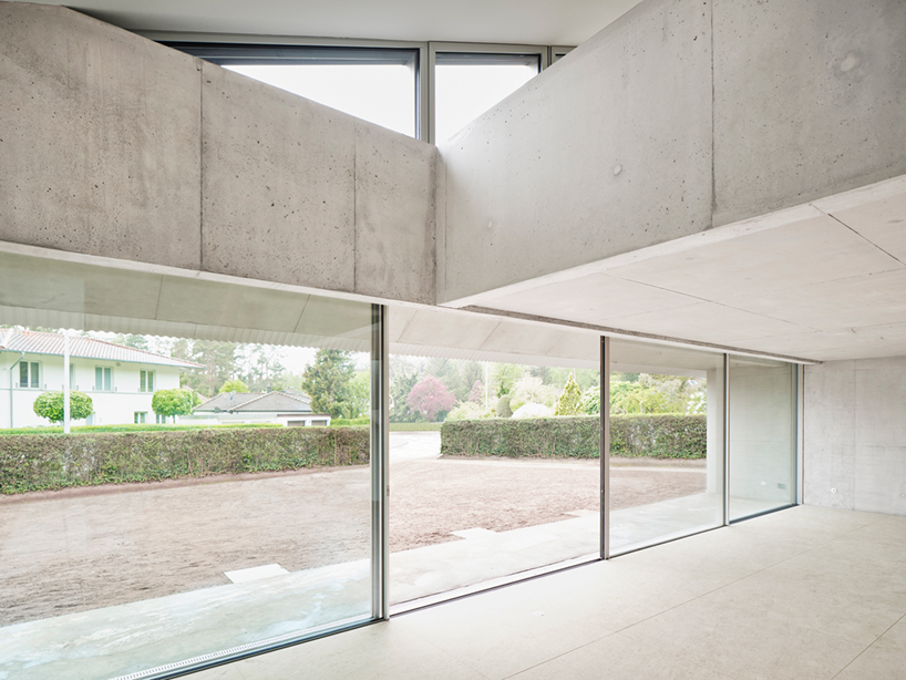 alex lehnerer's rühlstrasse house introduces curving concrete to bavaria