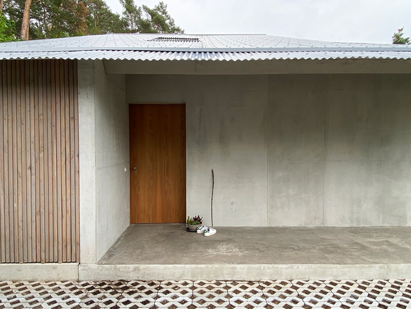 alex lehnerer's rühlstrasse house introduces curving concrete to bavaria