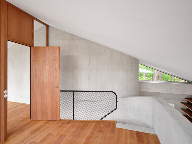 alex lehnerer's rühlstrasse house introduces curving concrete to bavaria