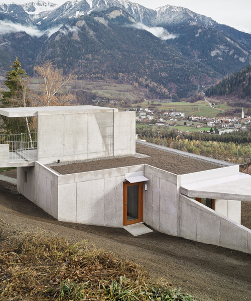 exposed concrete surfaces form this swiss house by angela deuber architects