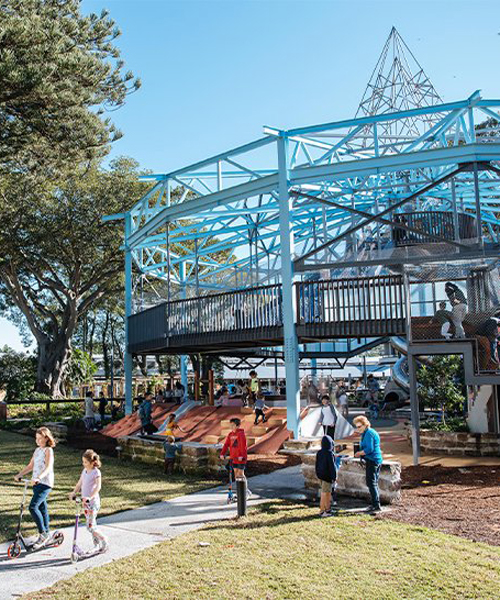 arcadia reuses an original horse sales ring to create a kids playground in sydney suburb