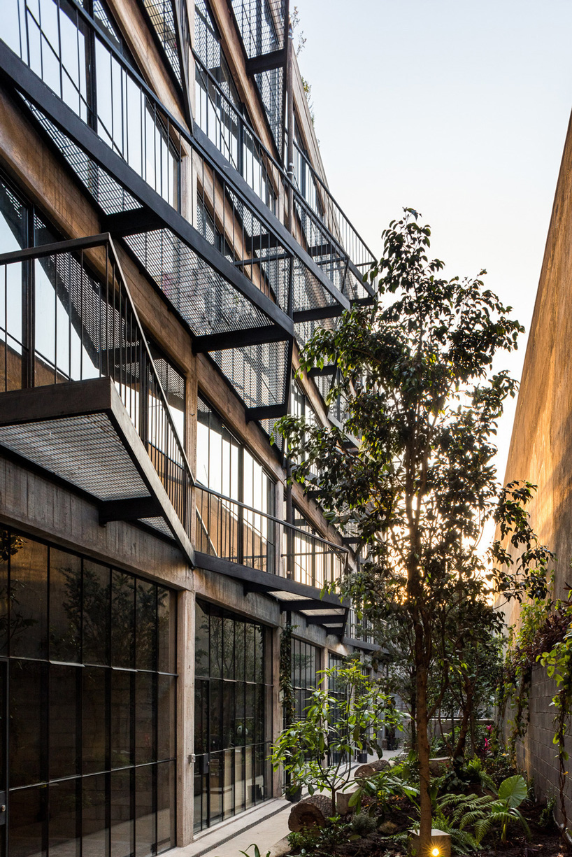 BAAQ' inserts wooden modular system to 1960s apartment building in mexico city