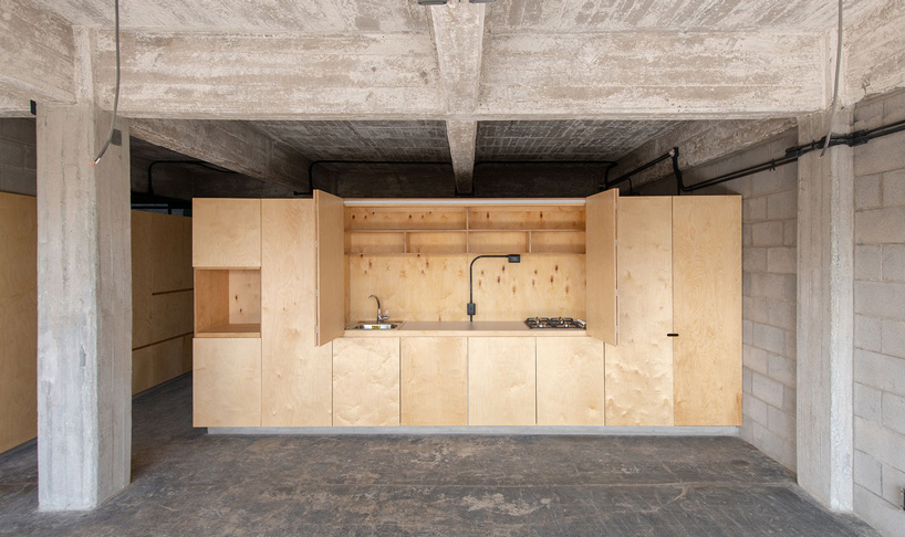 BAAQ' inserts wooden modular system to 1960s apartment building in mexico city