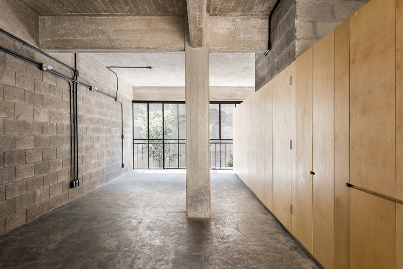 BAAQ' inserts wooden modular system to 1960s apartment building in mexico city