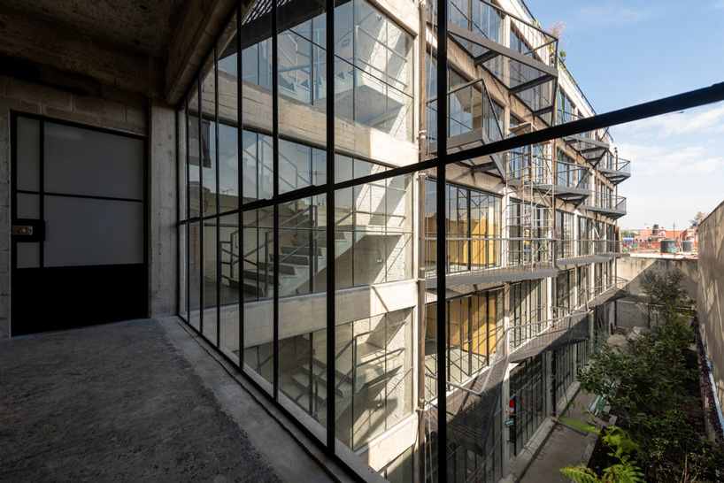 BAAQ' inserts wooden modular system to 1960s apartment building in mexico city