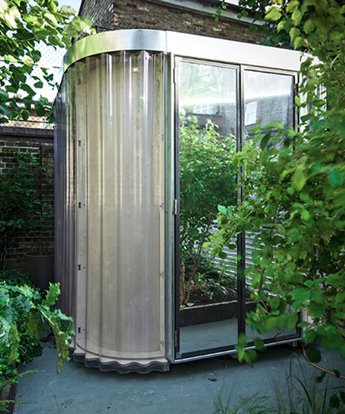 boano prišmontas' prefab work-from-home pod can be placed within any backyard garden