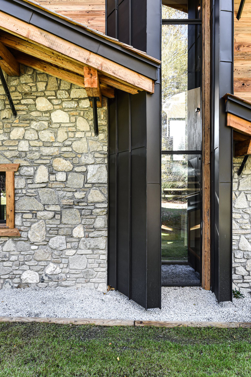 stone, metal, and wood on the exterior 