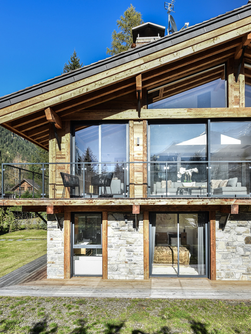 chevallier architectes tops alpine chalets with contemporary dormers in chamonix, france
