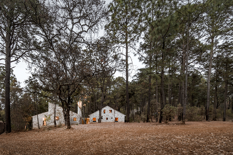 COA arquitectura's cozy stone DSA dwellings are huddled among the woods of jalisco