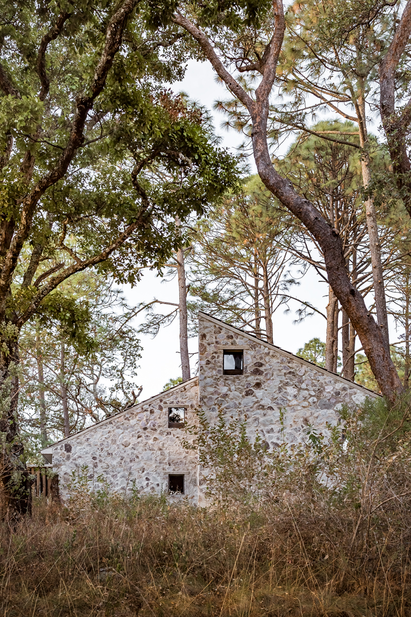 COA arquitectura's cozy stone DSA dwellings are huddled among the woods of jalisco