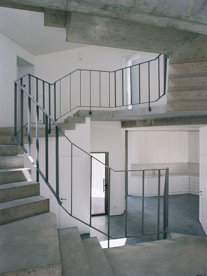 'trefoil house' in portugal by double (o) studio supports a rooftop lap pool