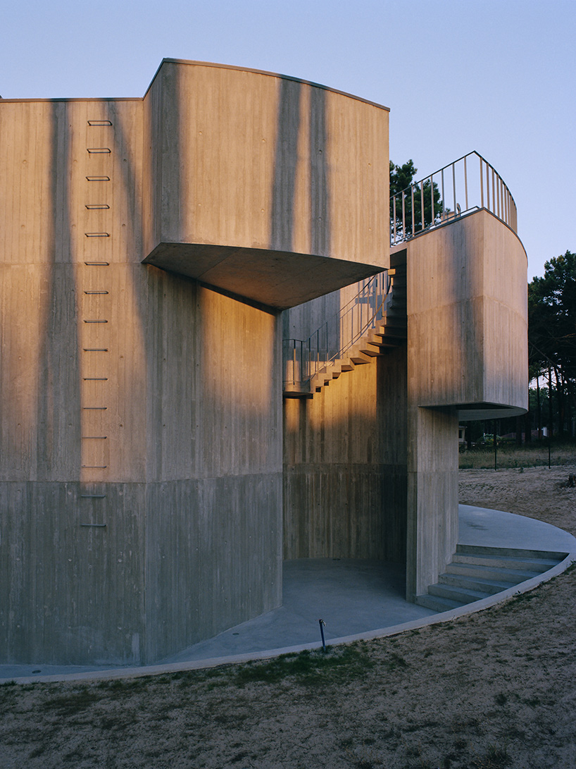 'trefoil house' in portugal by double (o) studio supports a rooftop lap pool