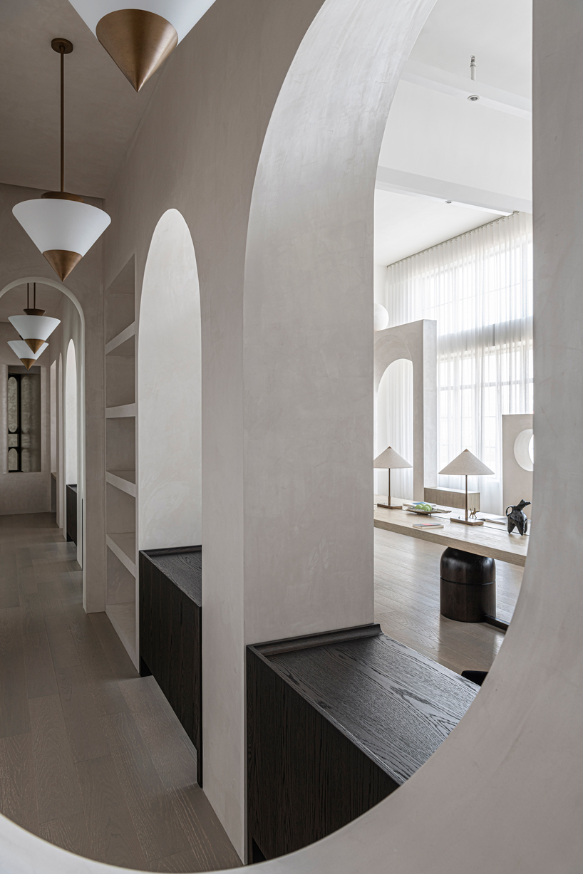 EVD designs own office space in shanghai using a repeating arched motif designboom