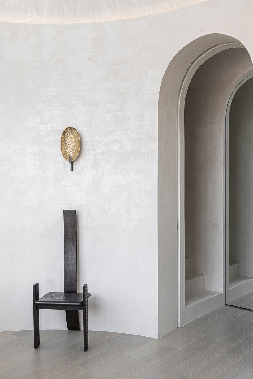 EVD designs own office space in shanghai using a repeating arched motif designboom