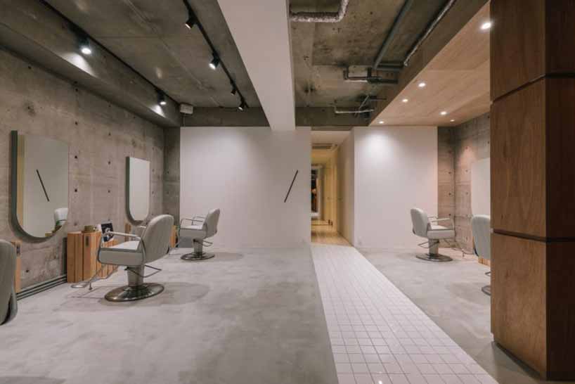 fathom clads japanese hair salon in façade of galvanized iron folding screens