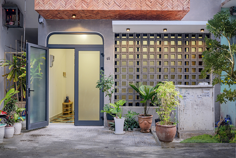 green concept adds a patterned brick façade to house 45 in vietnam