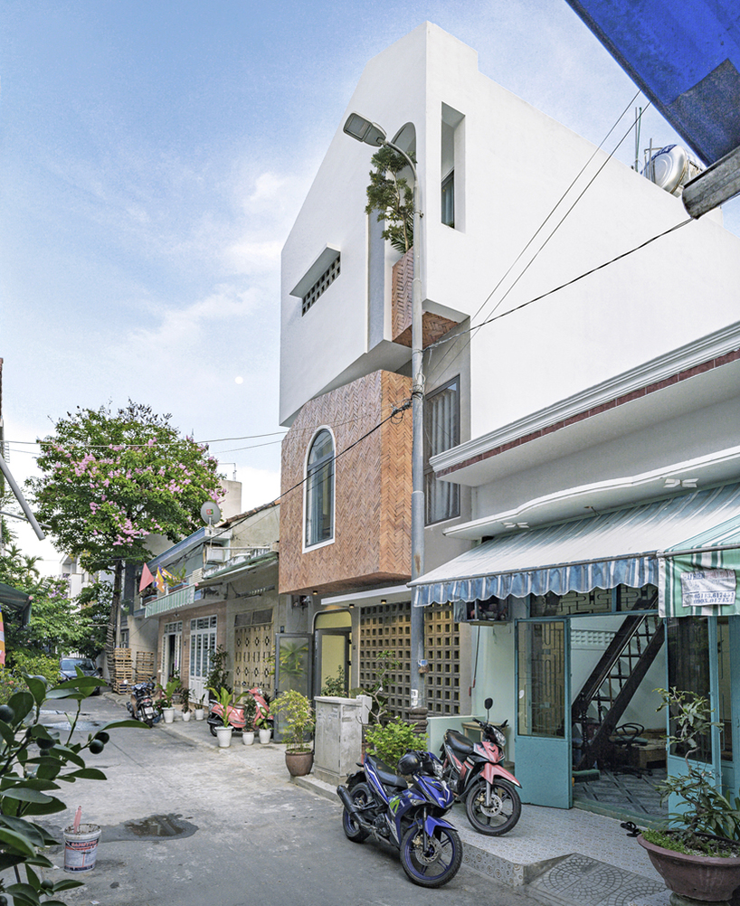 green concept adds a patterned brick façade to house 45 in vietnam