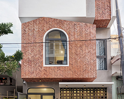 green concept adds a patterned brick façade to house 45 in vietnam