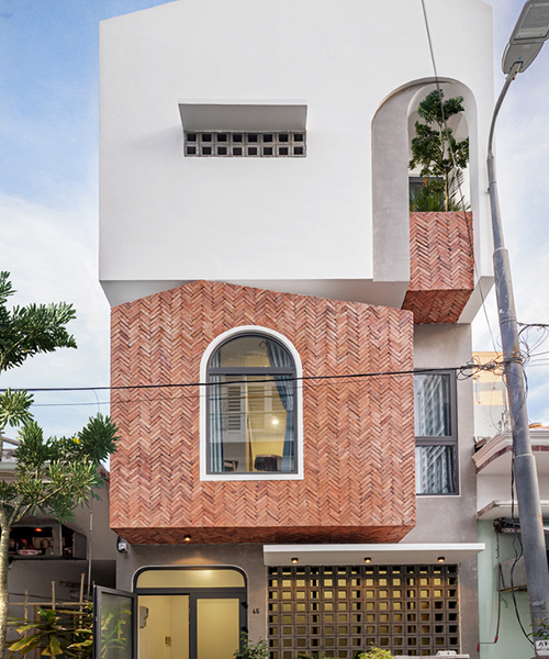 green concept adds a patterned brick façade to house 45 in vietnam