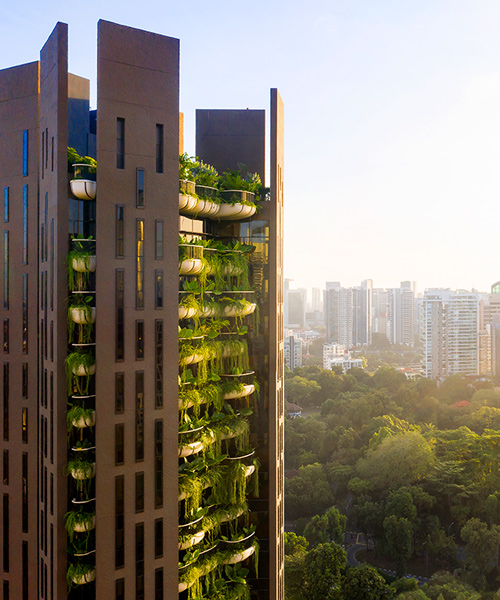 heatherwick studio's 'EDEN' tower in singapore immerses residents in nature